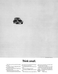 A small Volkswagen Beetle surrounded by white space above the Think Small headline.